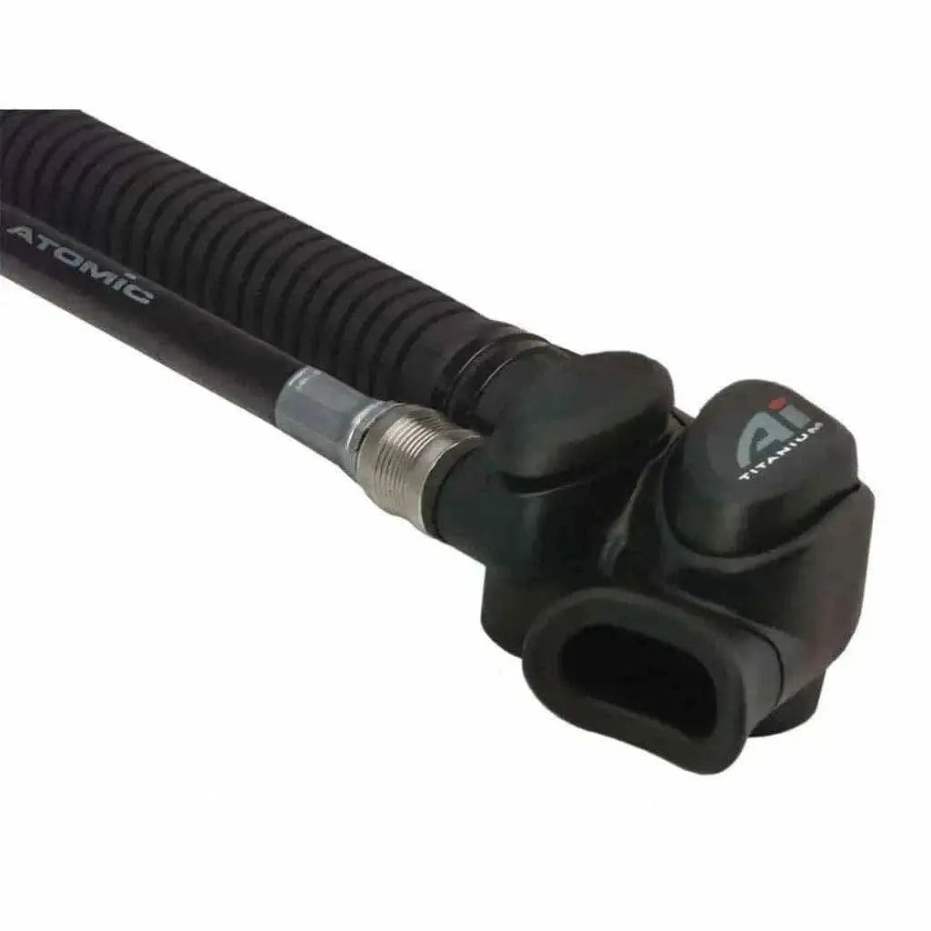 AI Atomic Inflator, Titanium in Black, showing push button controls for BCD inflation and deflation.