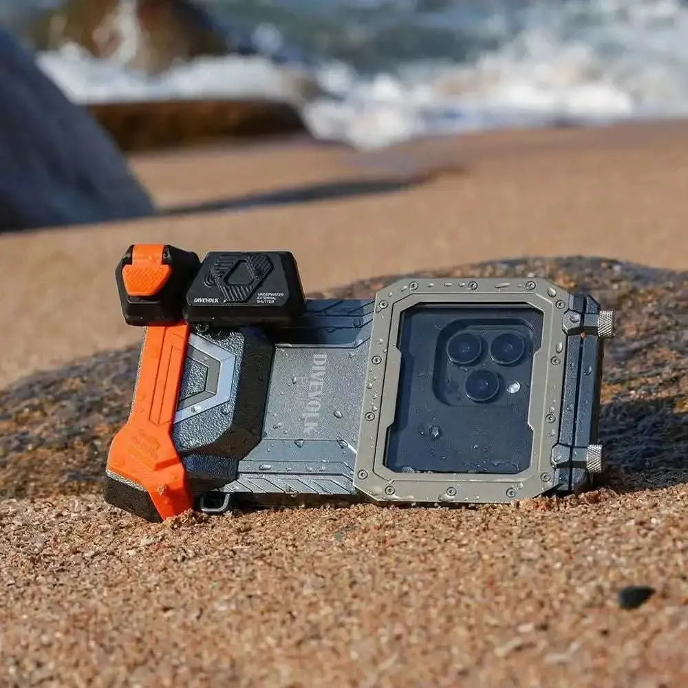 Divevolk externer Unterwasser-Auslöser auf Sand, ideal für Unterwasserfotografie.